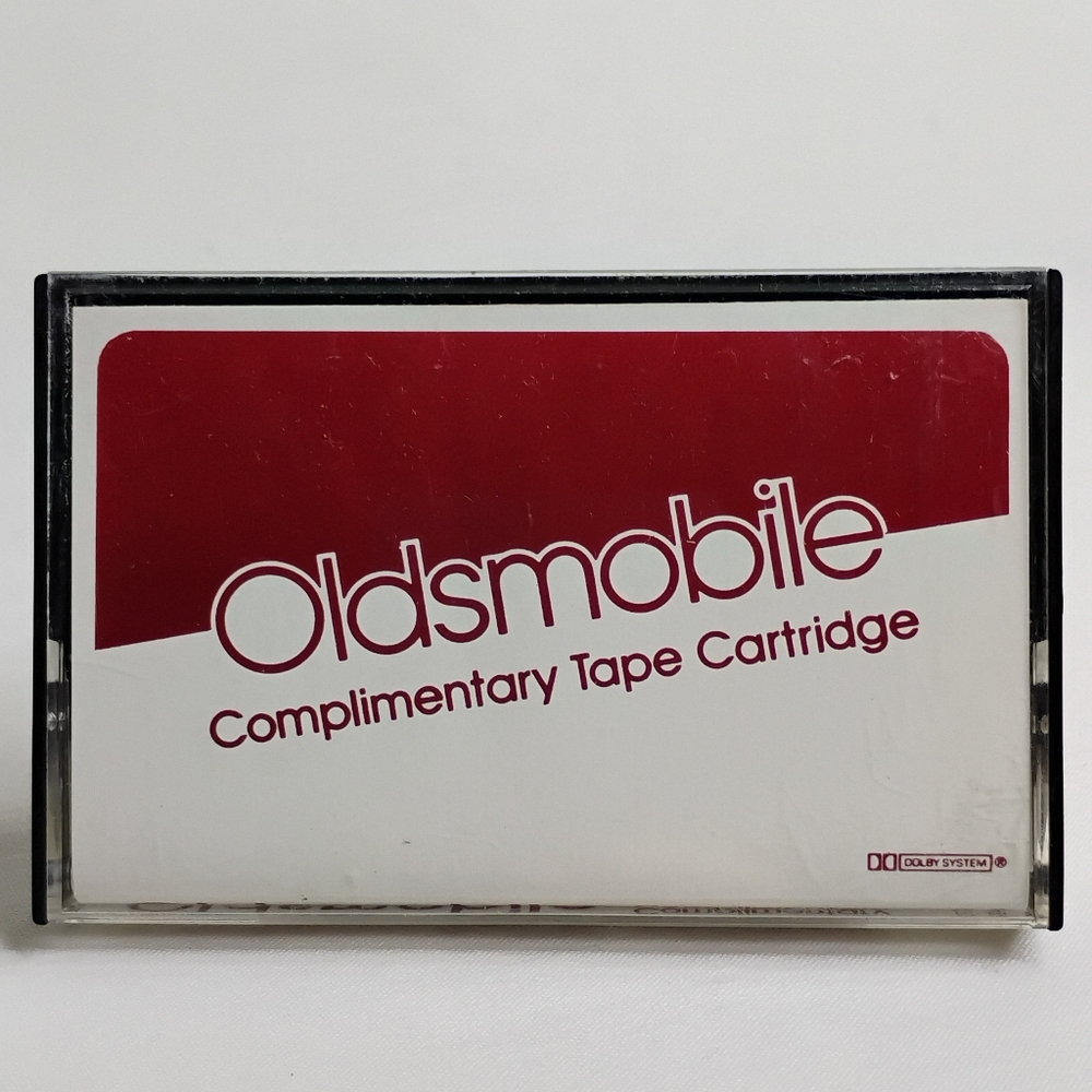 Vintage 80s Oldsmobile Complimentary Tape Cartridge Retro Music Cassette 1983